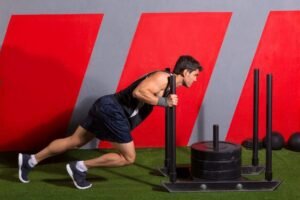 Functional Training Methods. Sled Drive. Full Body Workouts. Core Workouts. Hercules workout. functional strength training. exercises for strength training. upper body strength workouts. strength exercises for back. Barbell deadlifts. Compound lifts. Compound exercises. Muscular hypertrophy. Muscular strength. Triceps dip. Triceps exercise. Hex bar for deadlifts. Deadlifts. Tire exercises. Exercises for CrossFit. Sandbag exercises. Sandbag workout. Battleropes. Battleropes workouts. Keg exercises. Functional fitness.