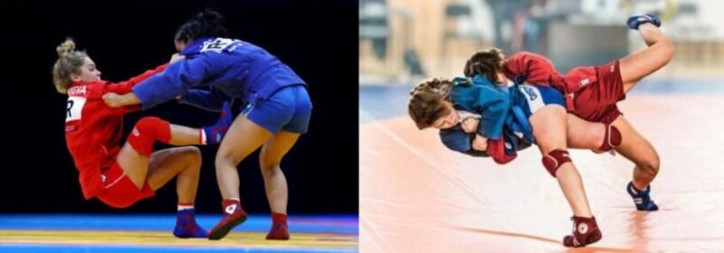 Female Sambo competitors engaged in a match during an international tournament.
