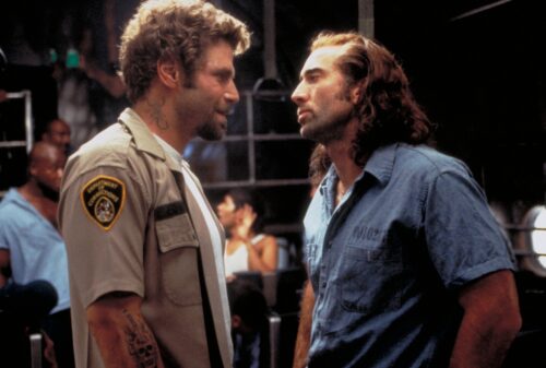 Billy Bedlam (left), portrayed by Nick Chinlund with Nicholas Cage as Cameron Poe.