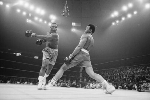 Muhammad Ali and Joe Frazier in the 1971 Fight of the Century, a historic clash of champions that embodied politics, pride, and the spirit of an era.