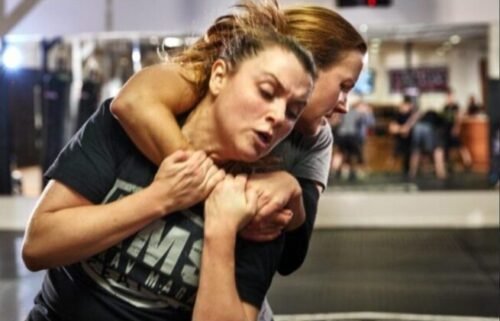 Krav Maga practitioners training drills involving striking, defence, movement, and close-quarters response techniques.
