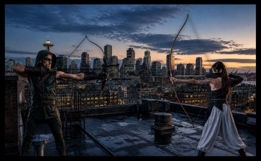Oliver Queen as Green Arrow facing Shado on a Seattle rooftop in the evening